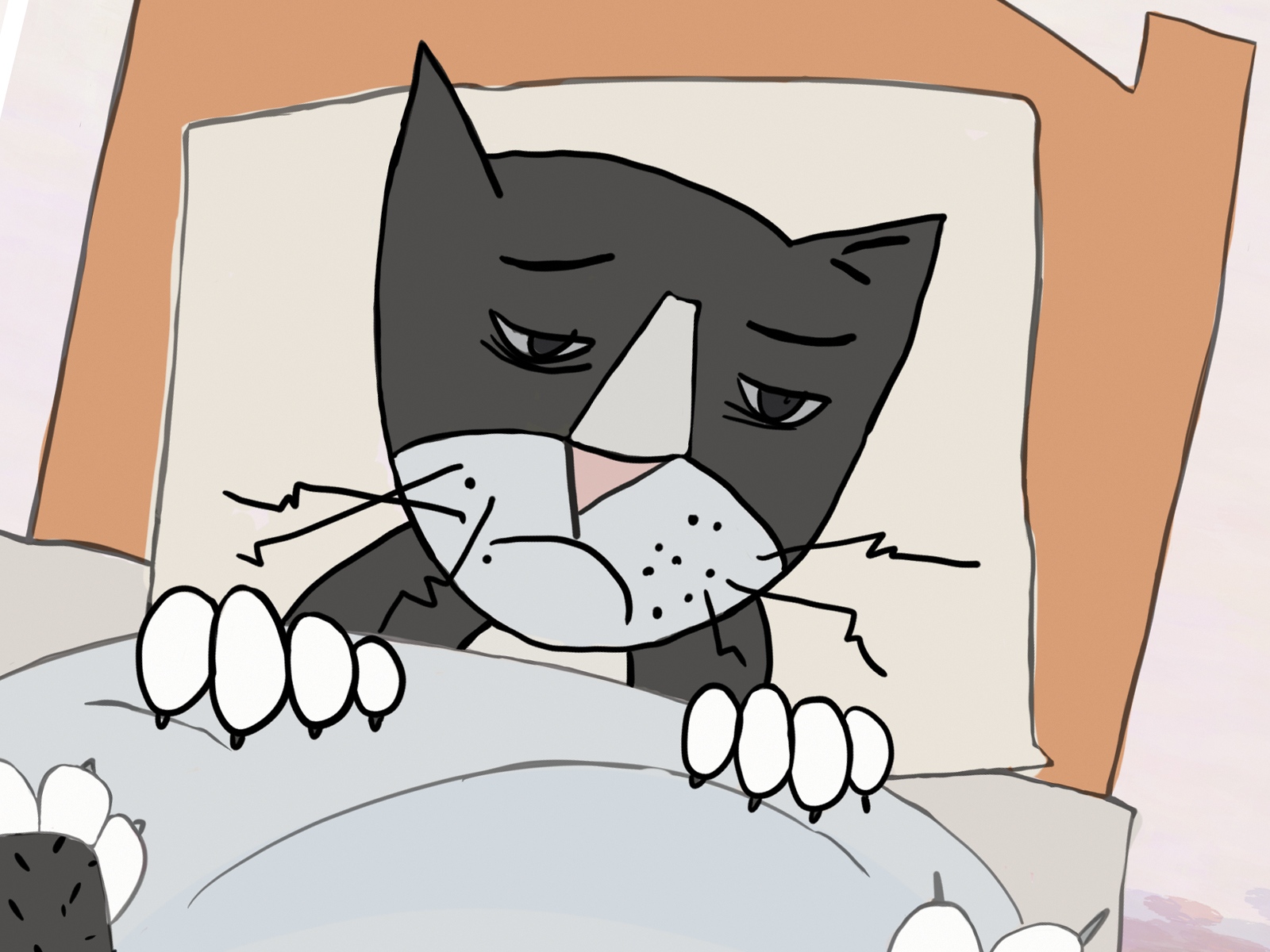 Chory kot w łóżku